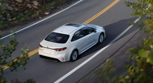 New Toyota Sedan driving in Frederick, MD