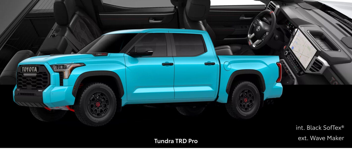 Three-quarter front view of a light blue Toyota Tundra TRD Pro paired with Black SofTex® interior cutout details.